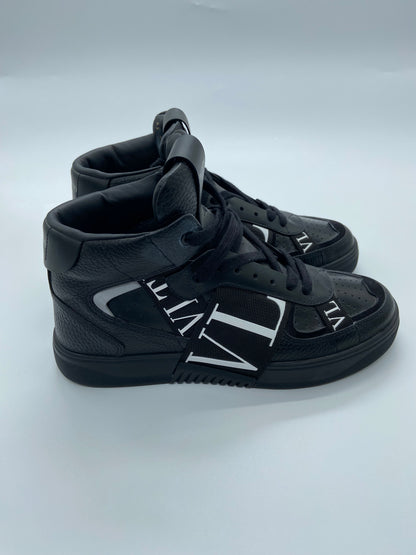 Valentino Garavan high top shoes with black background